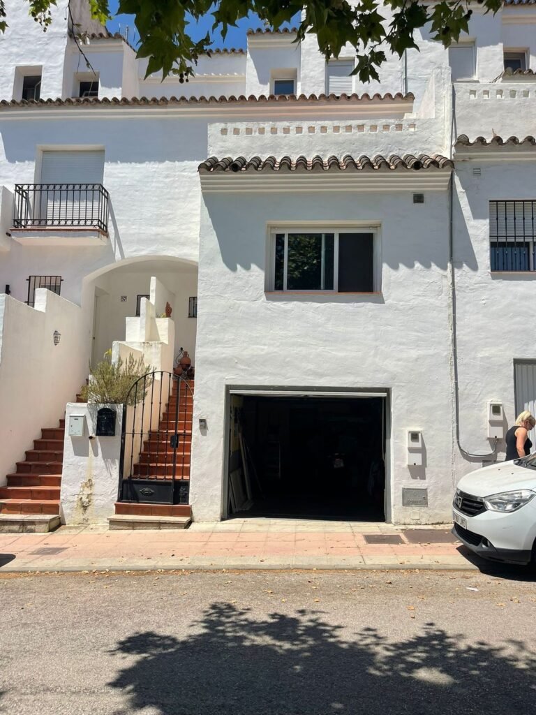 3 Bed Townhouse for Sale in Estepona – Garage, Terraces & Park Outlook