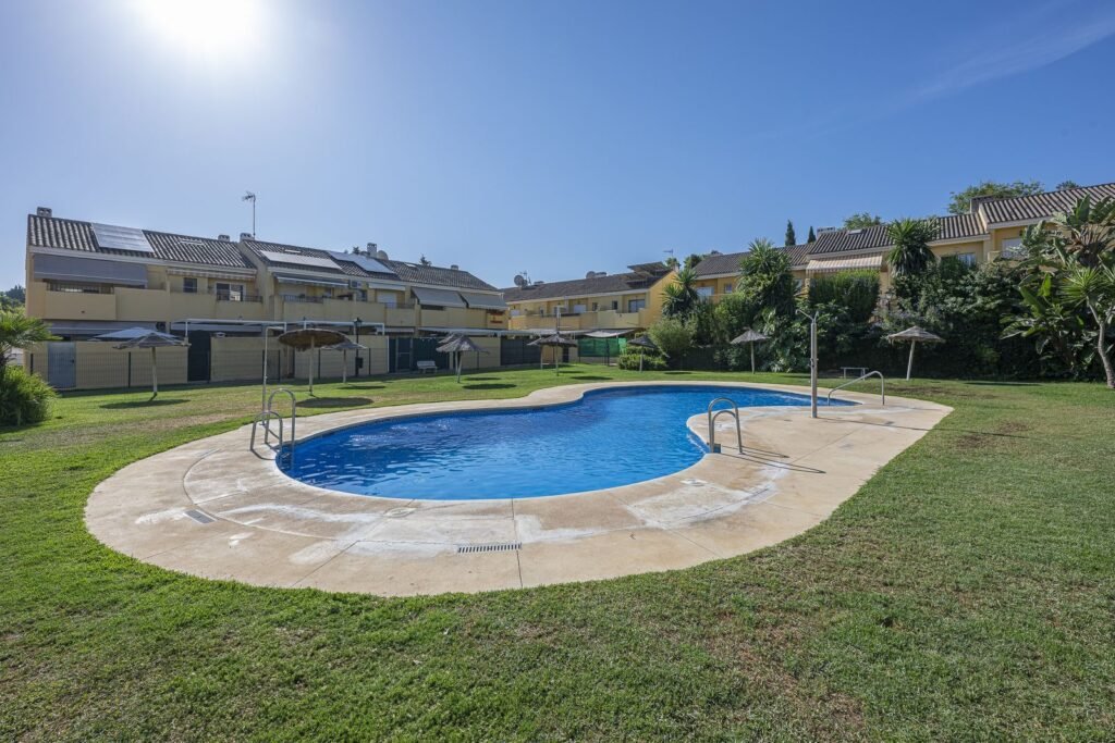 3 Bed Townhouse for Sale in Estepona – Solar Panels, Pool & Private Patios