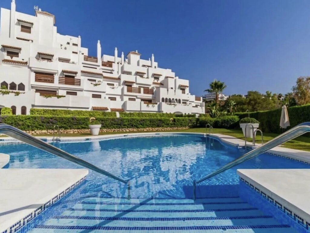 1 Bed Ground Floor Apartment for Sale in Selwo – Private Garden, Pool & Padel