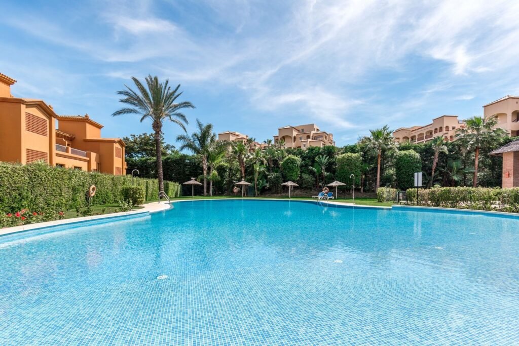 3 Bed Ground Floor Apartment for Sale in Estepona – 2 Parking Spaces & Resort Facilities
