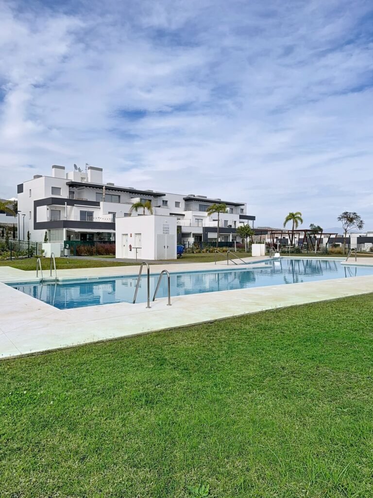 2 Bed Ground Floor Apartment for Sale in Estepona – Corner Unit with Glass Terrace
